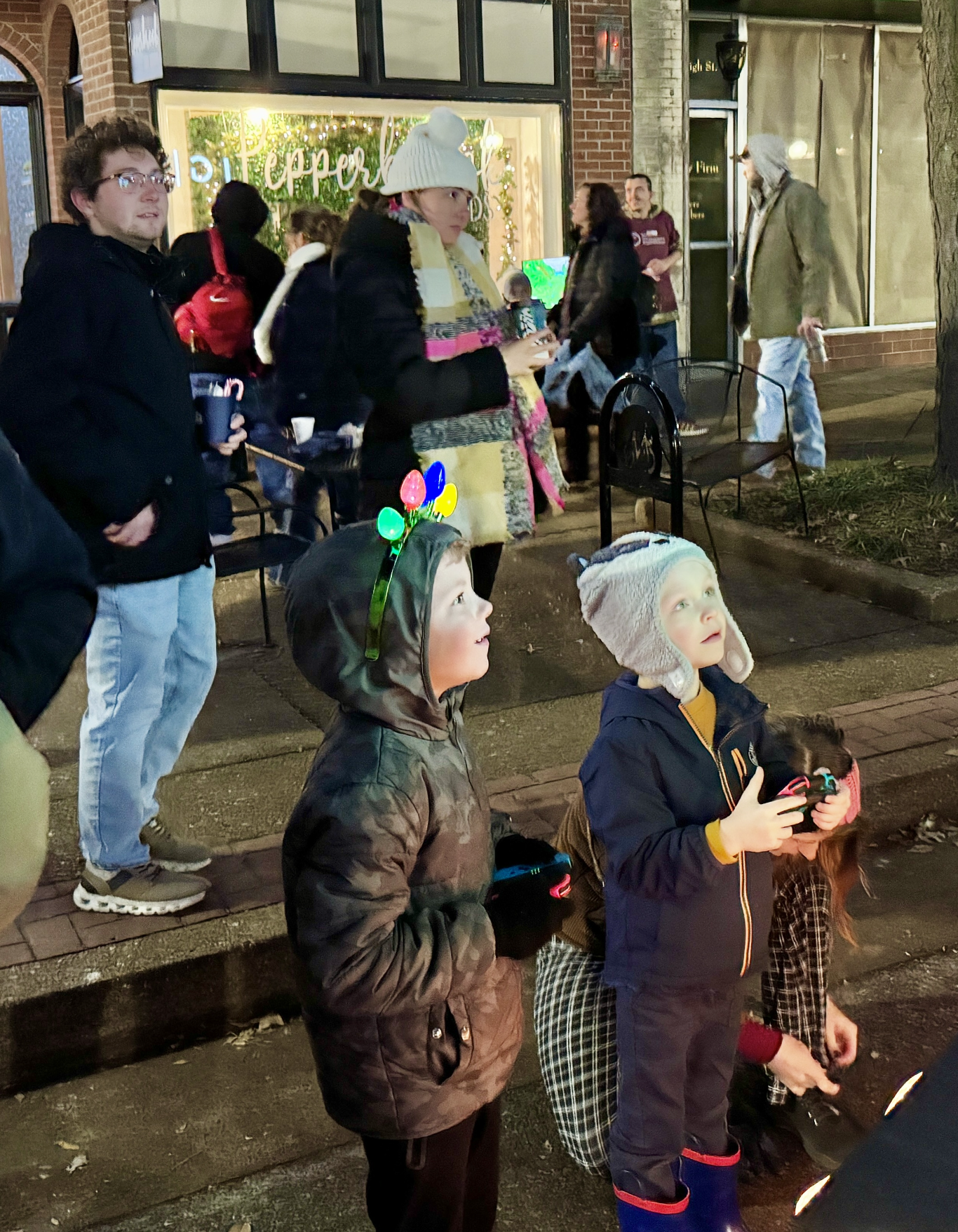 Community members gaming together at Living Windows downtown Jefferson City event 2025